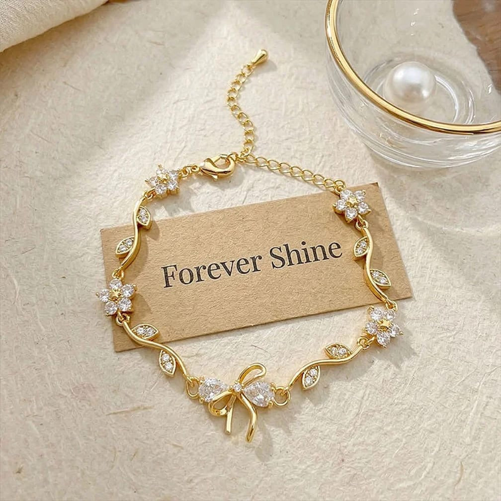 Floral Bow Bracelet – Crystal Flower & Bow Charm Gold Chain