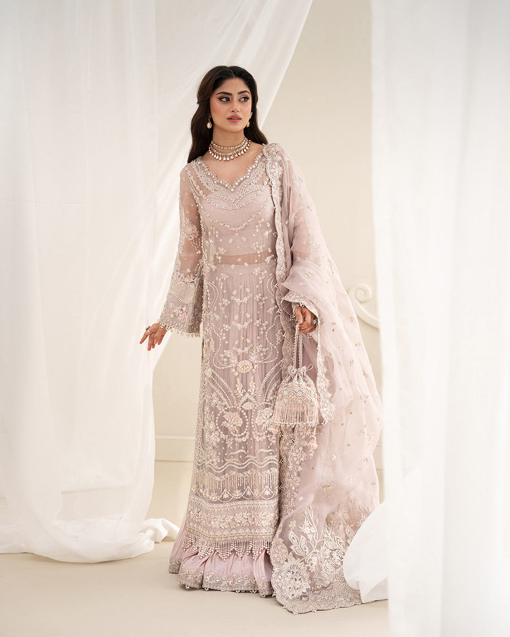 FAIZA SAQLAIN ELA
