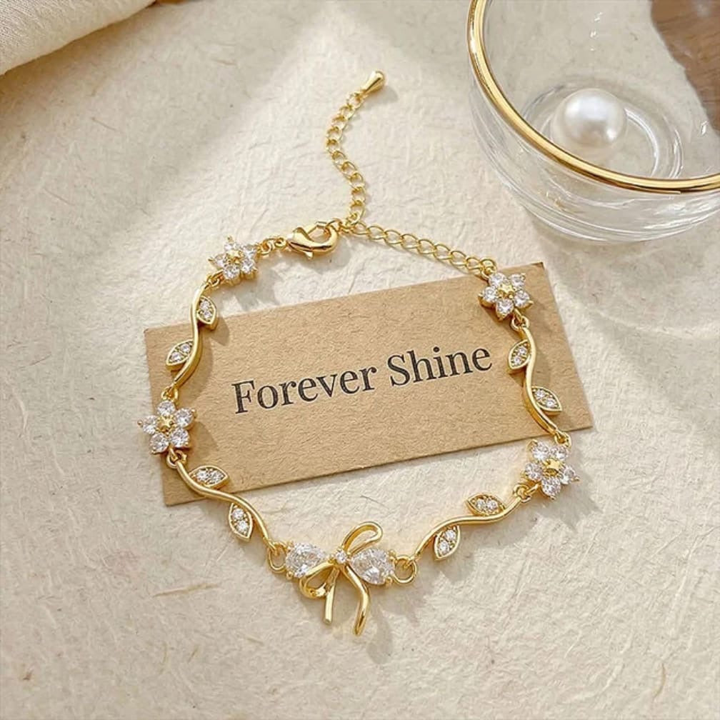 Floral Bow Bracelet – Crystal Flower & Bow Charm Gold Chain